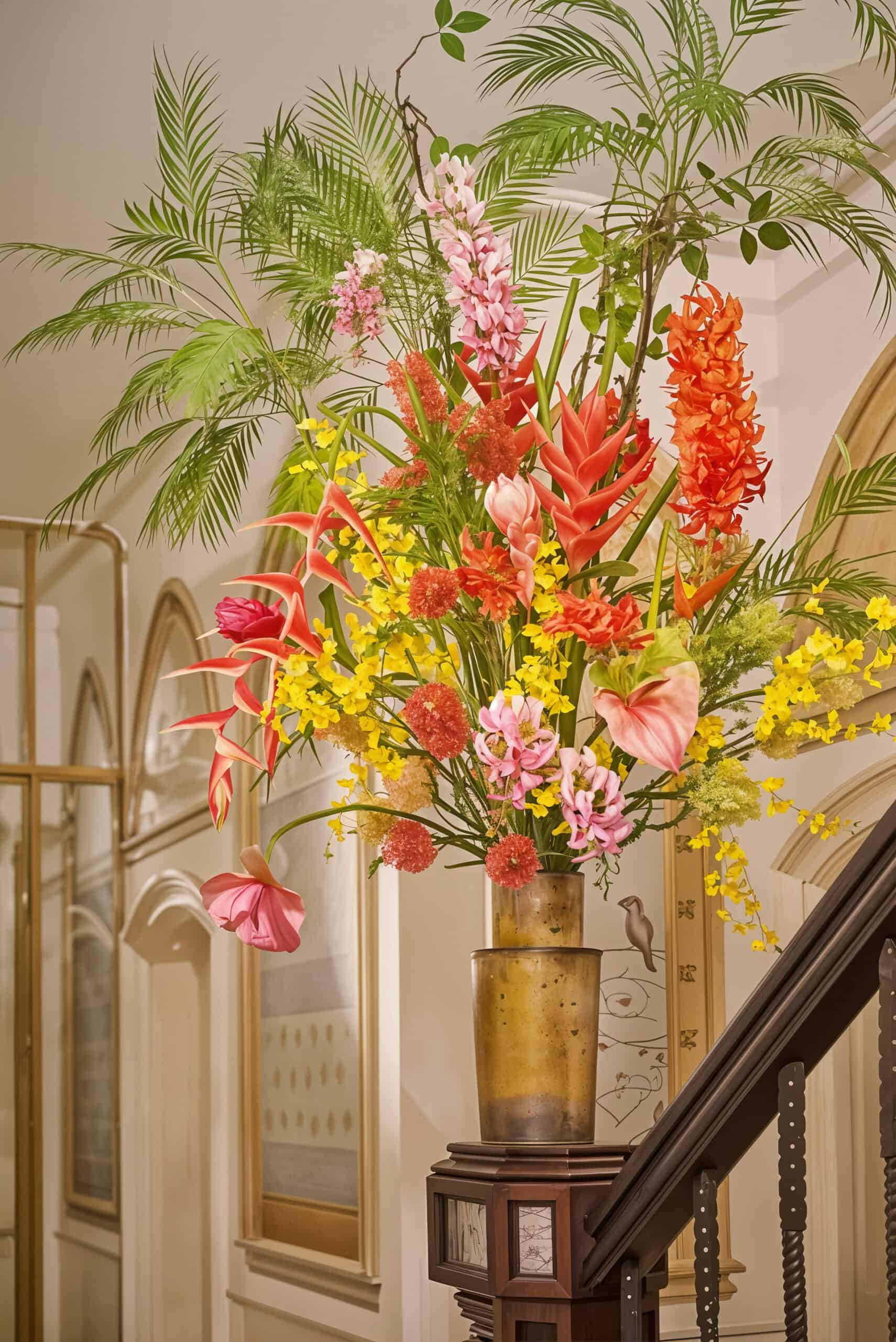 Breathtaking silk Heliconia stems with Mediterranean palms ideal to rent for an event or your business